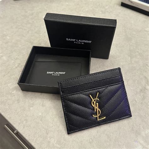 how to spot fake ysl card holder|ysl card holder monogram.